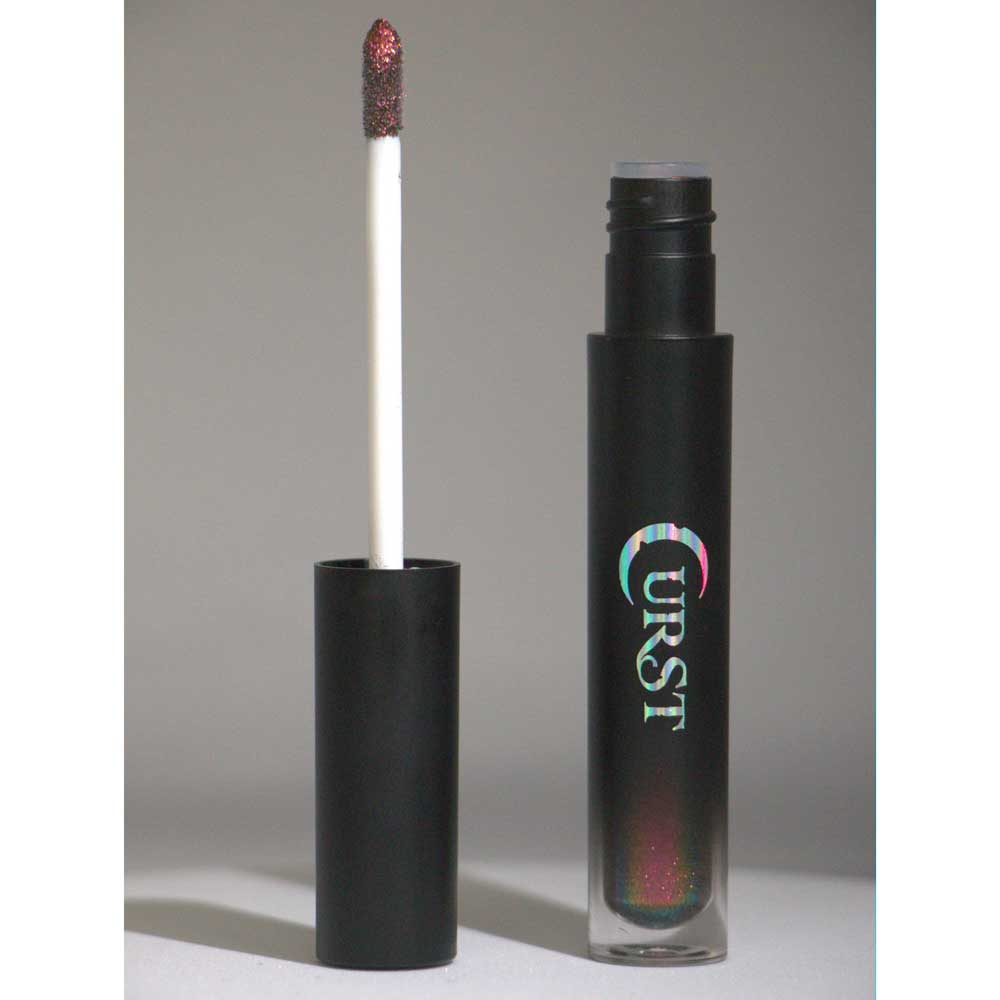 Black lip gloss with applicator on a gray background