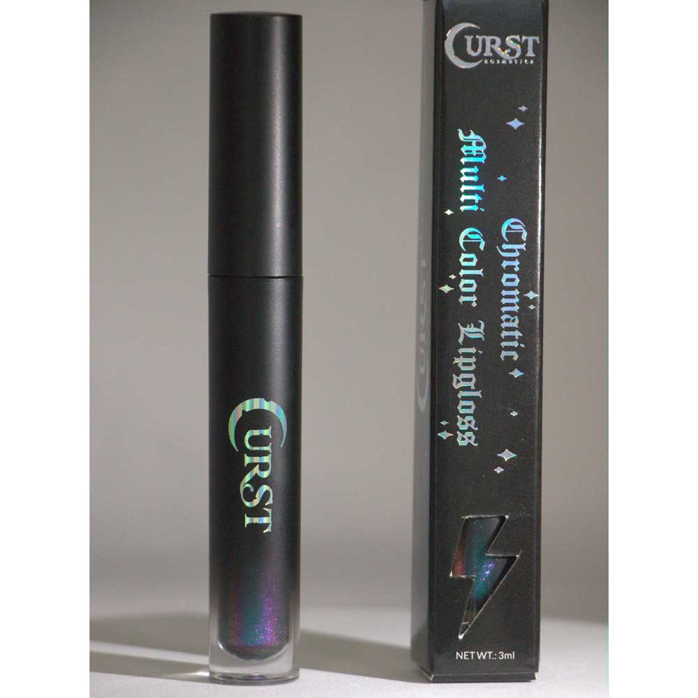 Black lip gloss with 'Curst' branding next to its packaging on a gray background