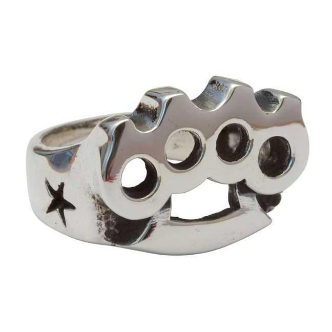 Silver knuckle duster ring with a star on a white background