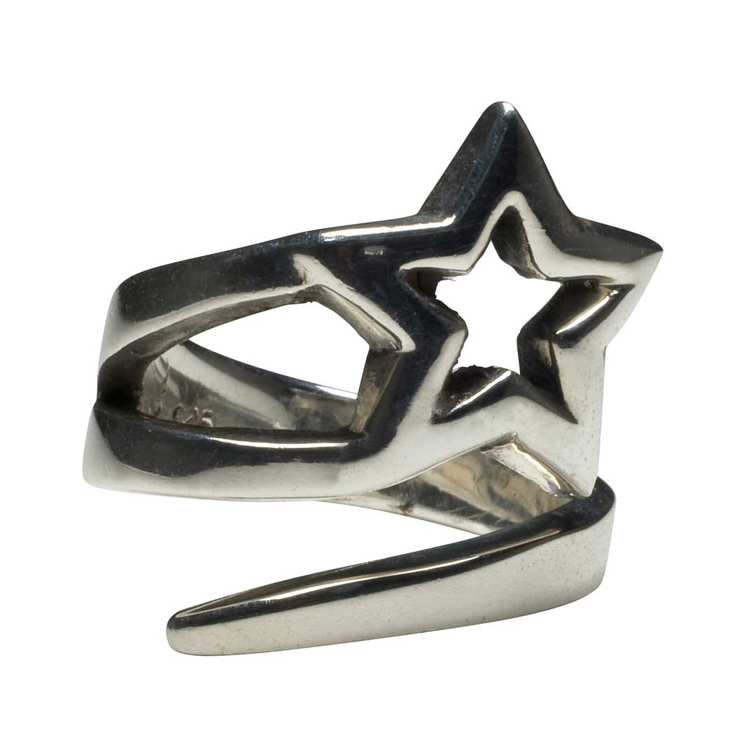 Silver star-shaped ring on a white background