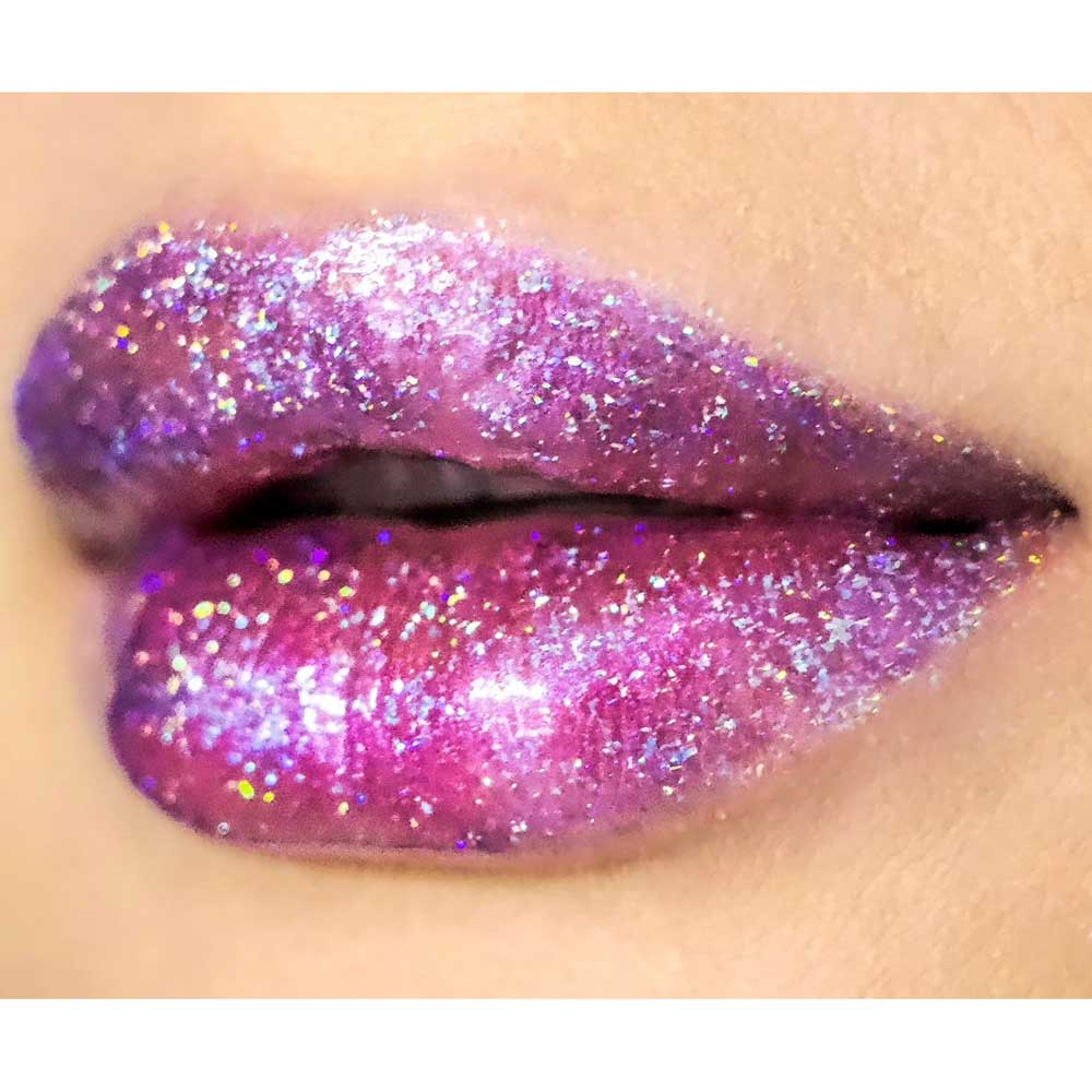 Close-up of lips with glittery pink and purple lipstick