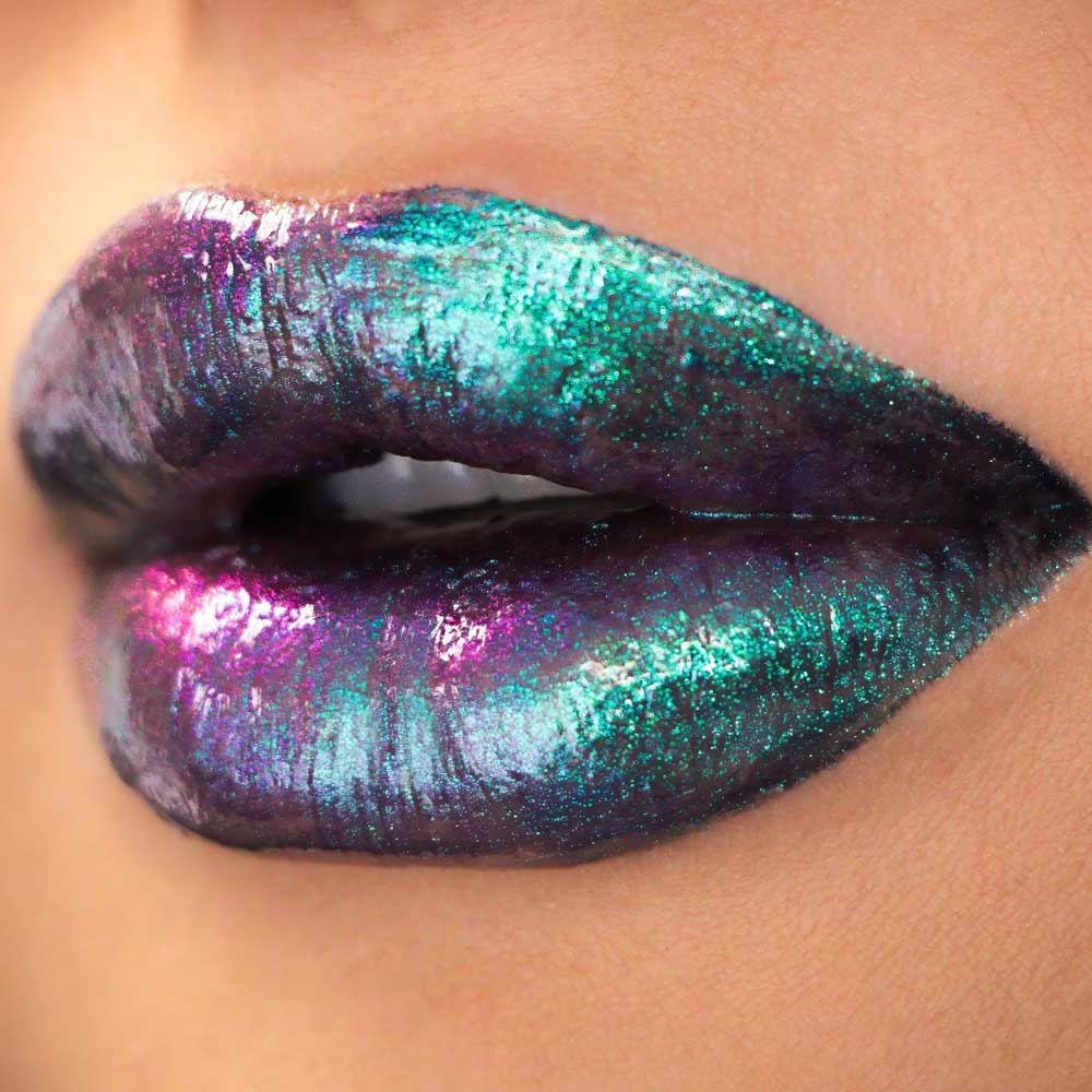 Close-up of lips with multicolored, glittery lipstick