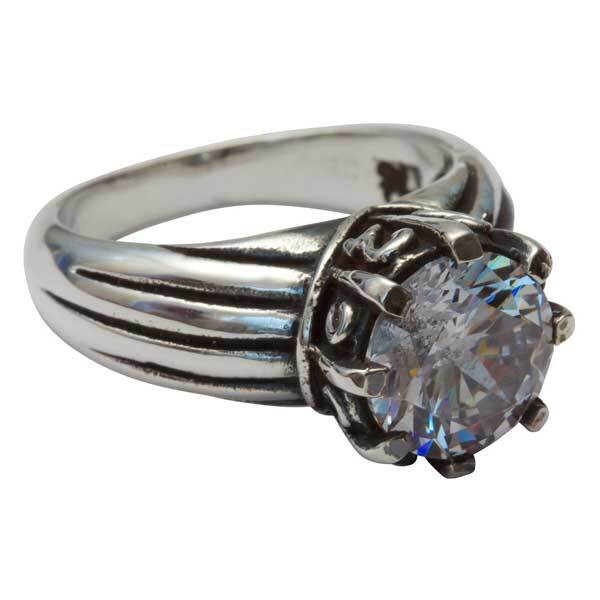 Silver ring with a large gemstone on a white background