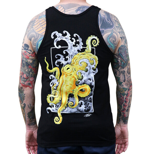 Black tank top with a colorful octopus design on a person with tattoos.