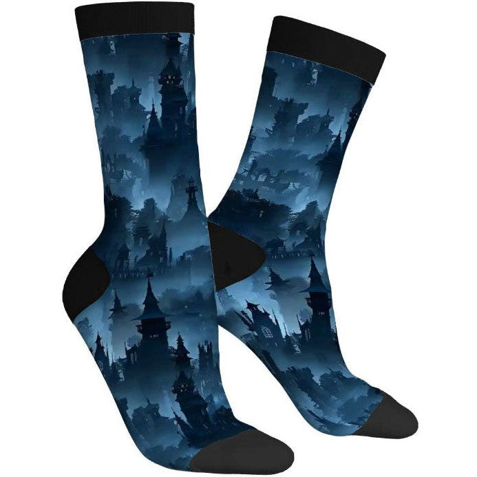 Pair of socks with a dark blue castle silhouette pattern on a white background