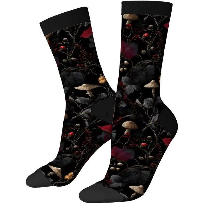 Pair of socks with a dark forest design featuring mushrooms and leaves on a white background