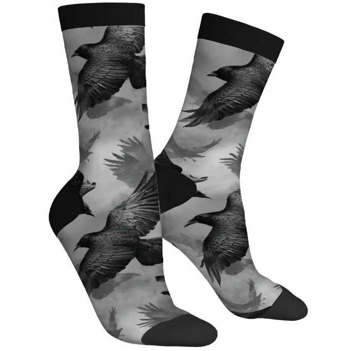 Socks with black and gray bird design on a white background