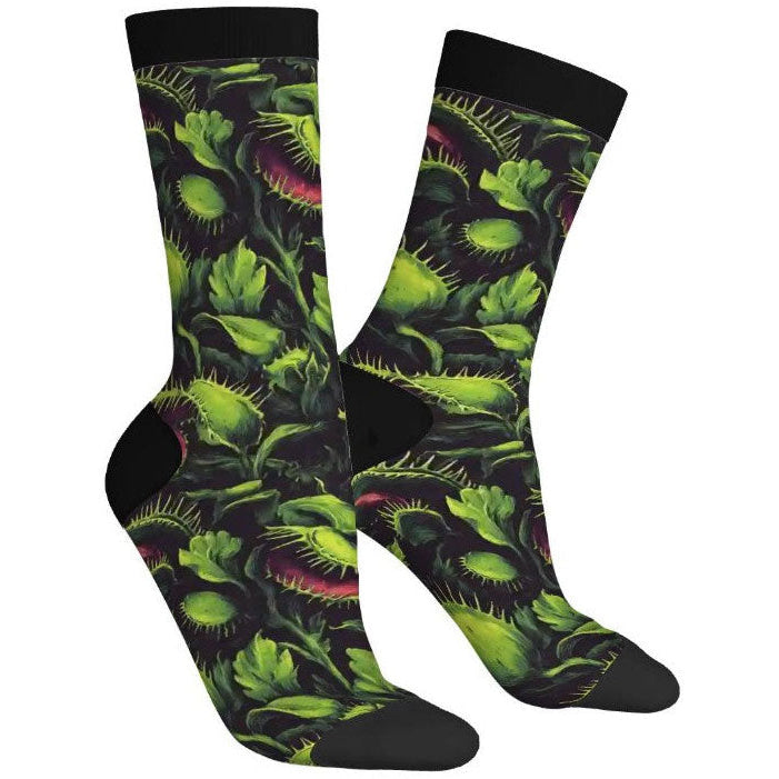 Socks with carnivorous plant design on a white background